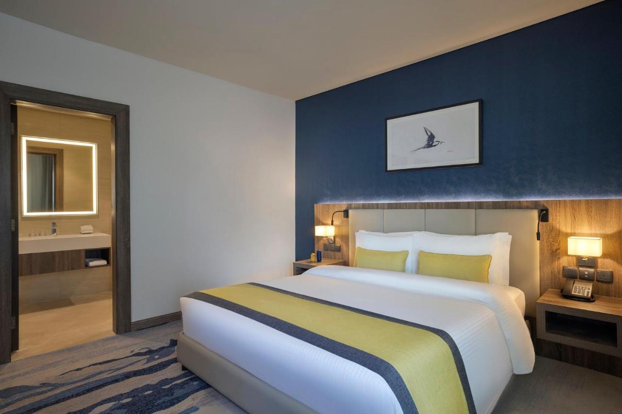 Voco Al Khobar By Ihg Hotel Ngoại thất bức ảnh A bedroom at the hotel
