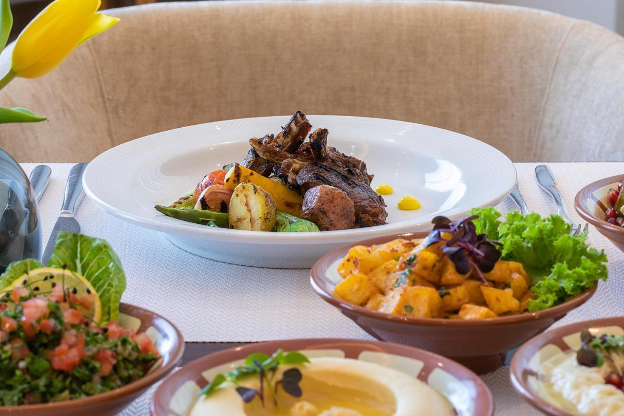 Voco Al Khobar By Ihg Hotel Ngoại thất bức ảnh A selection of dishes at the restaurant
